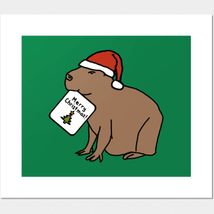 Cute Capybara says Merry Christmas Posters and Art